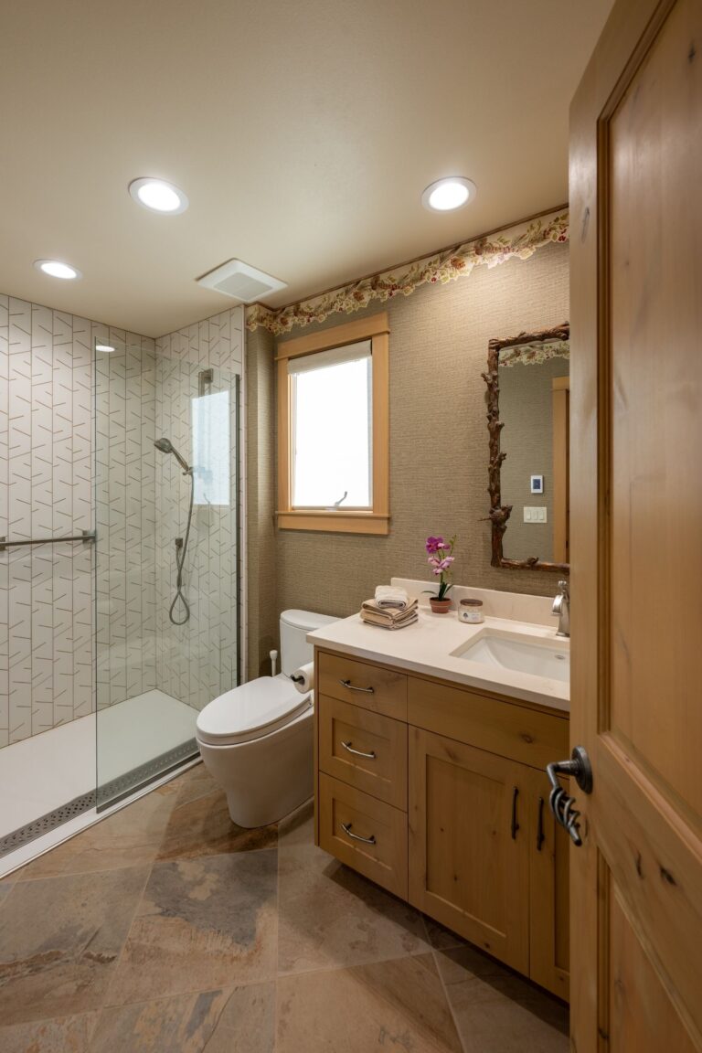 A spa-inspired bathroom designed for comfort and timeless elegance.
