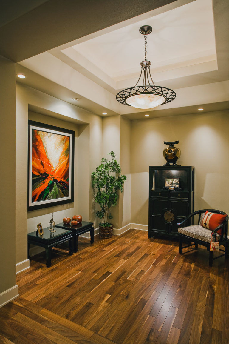 Foyer, walnut hardwood floor, lighting, light trough