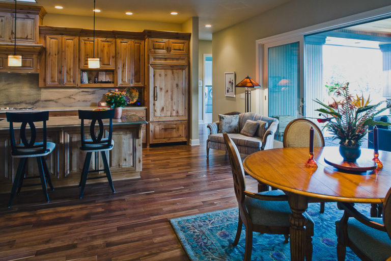 Kitchen, walnut hardwood floor, Andersen patio door, cabinet