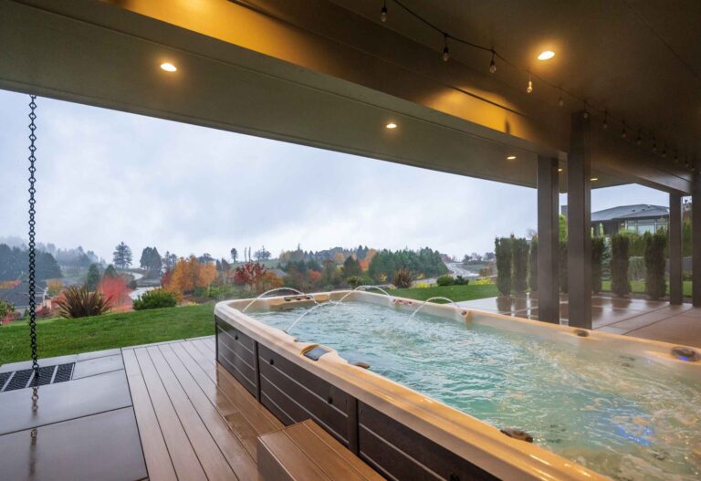 Relax in a heated swim spa under a covered patio while enjoying stunning views of the Willamette Valley.